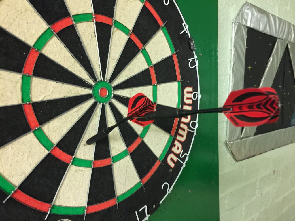 Darts into each other